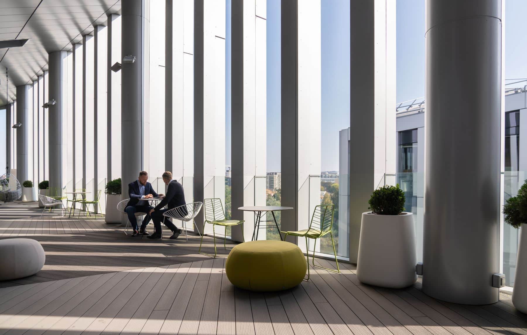 two people discussing cover outdoors