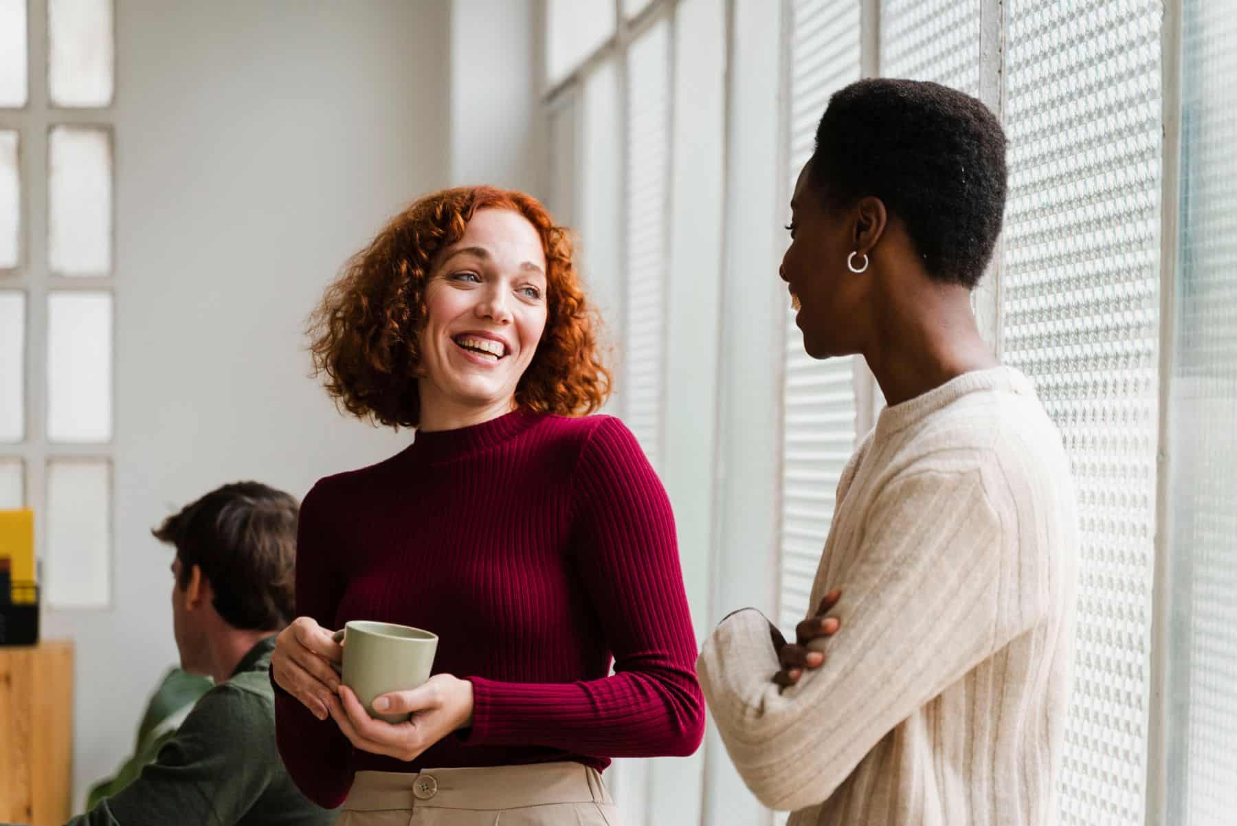 people talking in an office
